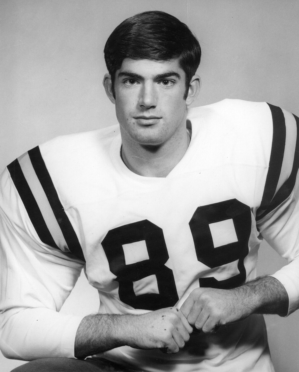 A CHANGE IN NUMBER? Actually, Joe wore jersey 60 on the team, but when it came time for his yearbook picture the photographer wanted a cleaner jersey, hence he wore 89.
